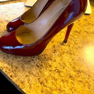 - Rare Christian Lou buitton- ruby red pumps
